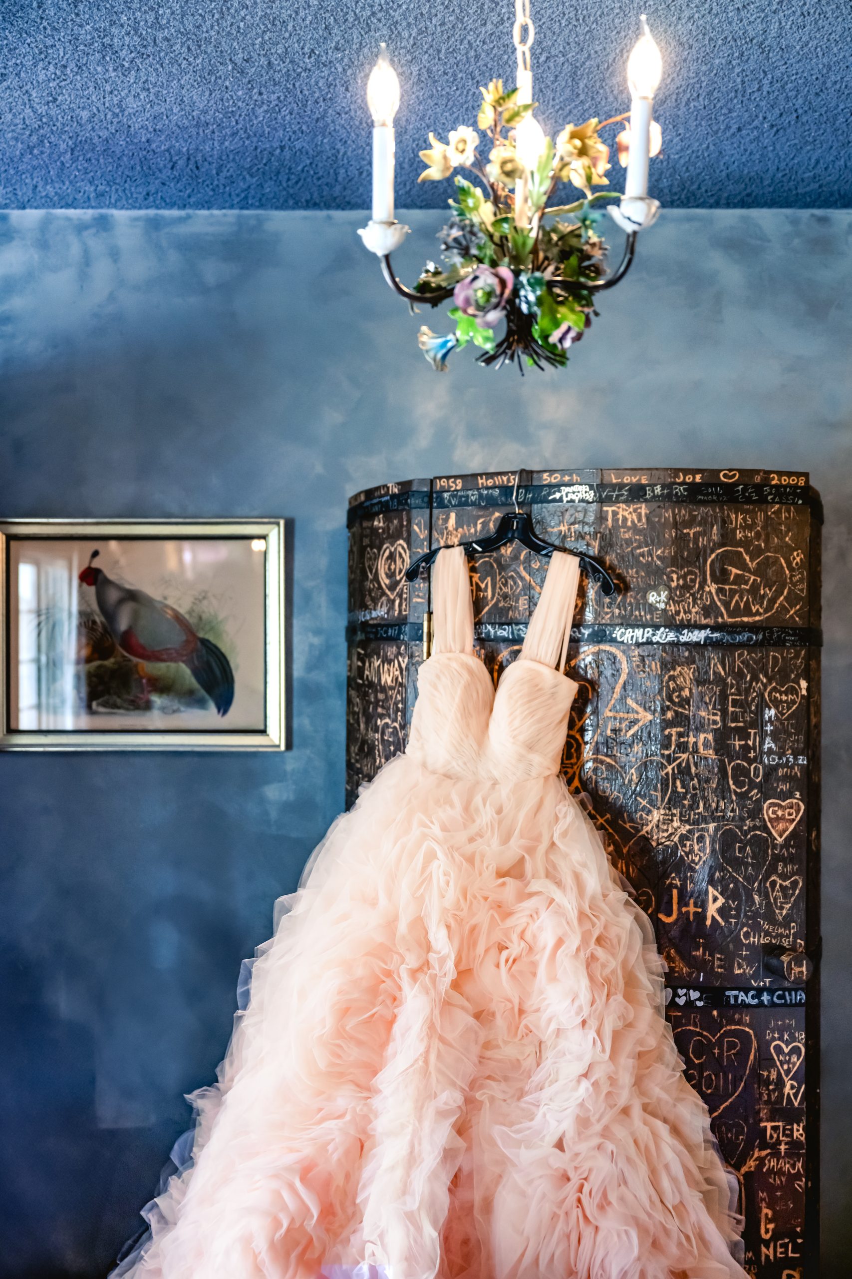 Pink Wedding Dress hanging from Barrel