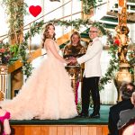 the bride glances amusedly over her shoulder during the ceremony