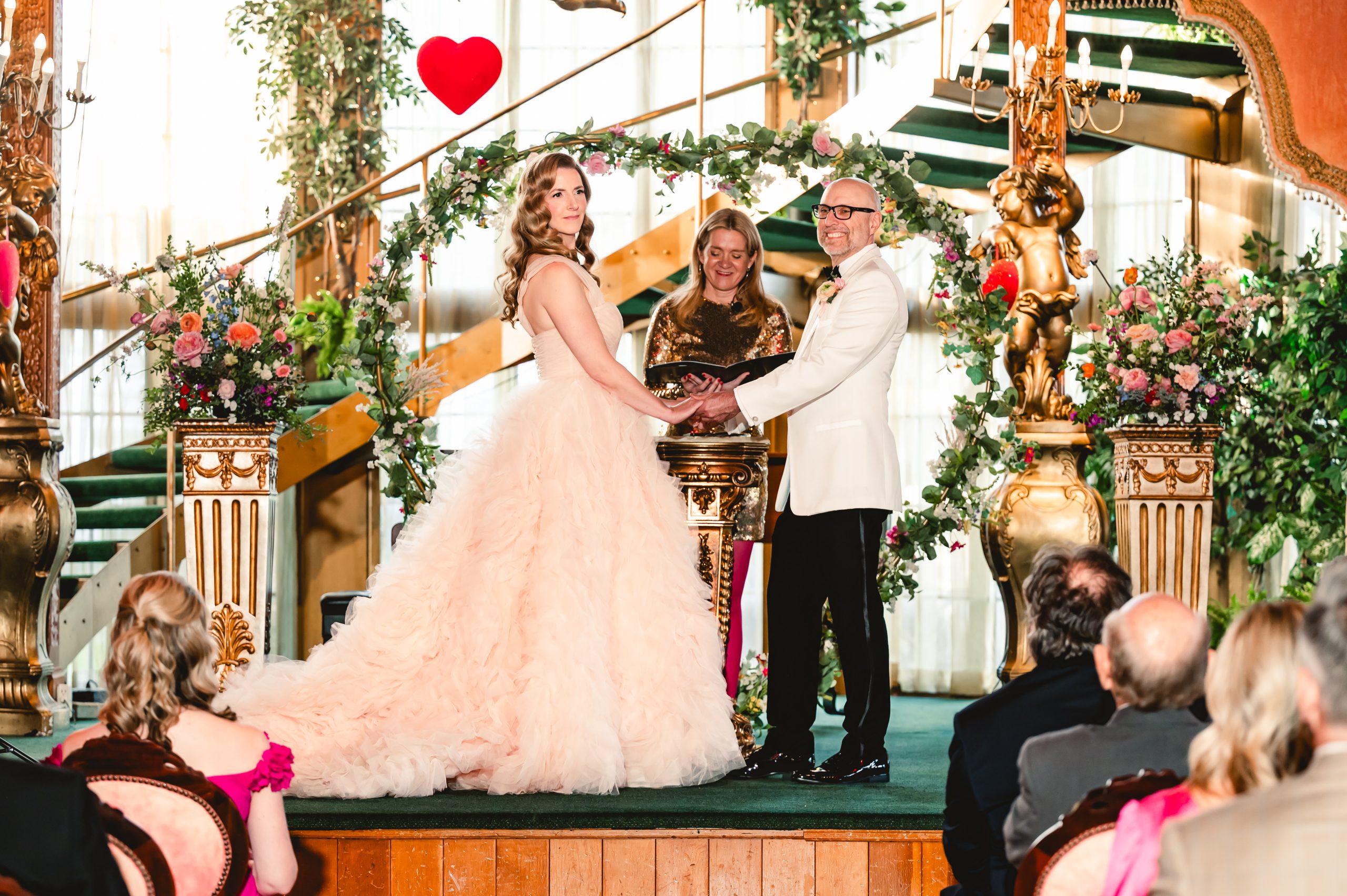 the bride glances amusedly over her shoulder during the ceremony