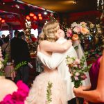 the couple shares a moment as the chaos around them goes on