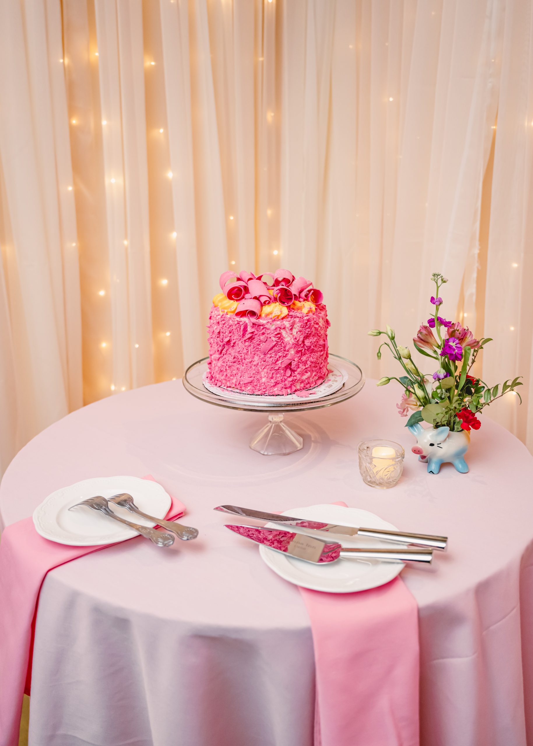 the pink champagne cake is a pink frosting covered vanilla filled masterpiece only found at Madonna Inn