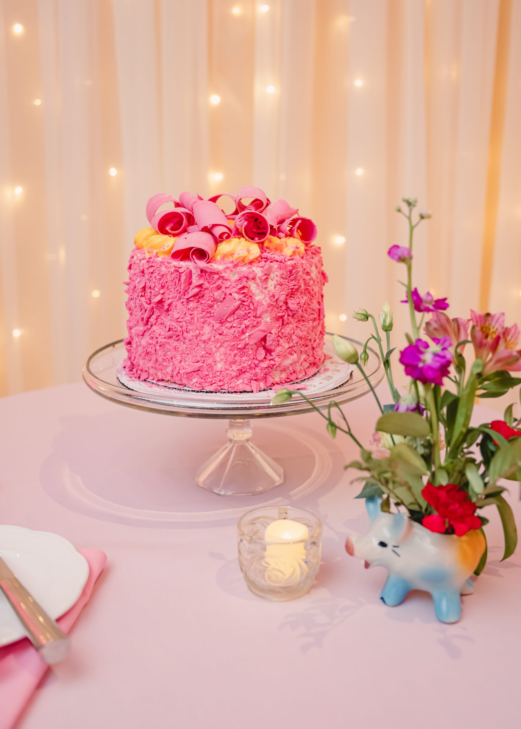 the pink champagne cake is a pink frosting covered vanilla filled masterpiece only found at Madonna Inn