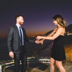 wedding guests have fun during sunset
